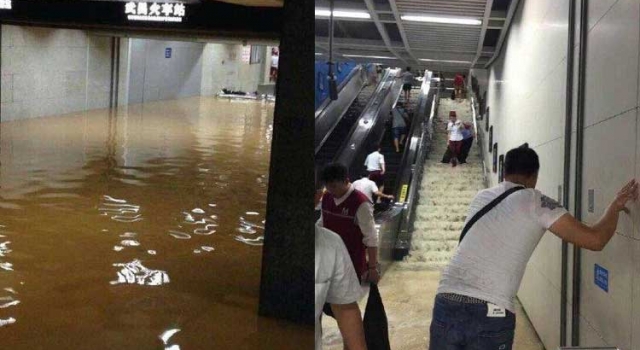 武汉遇特大洪水地铁站变瀑布 场面壮观乘客扶墙走