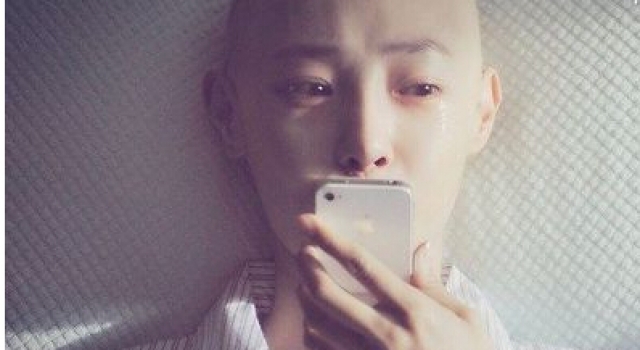 怀孕5个月发现患上淋巴癌 老公剃光头与妻共进退