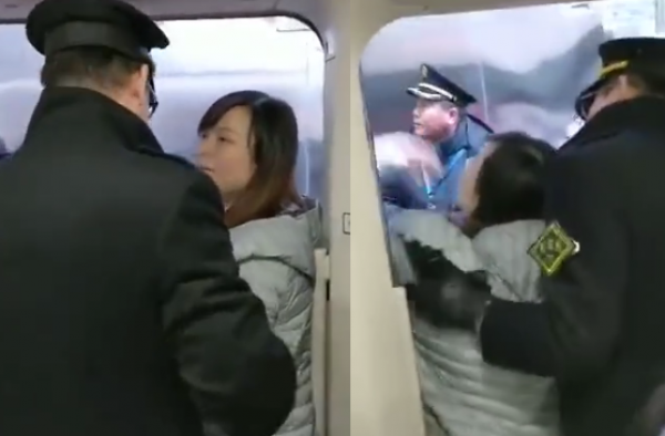 女子拼命阻碍高铁发车 原因竟是丈夫没上车